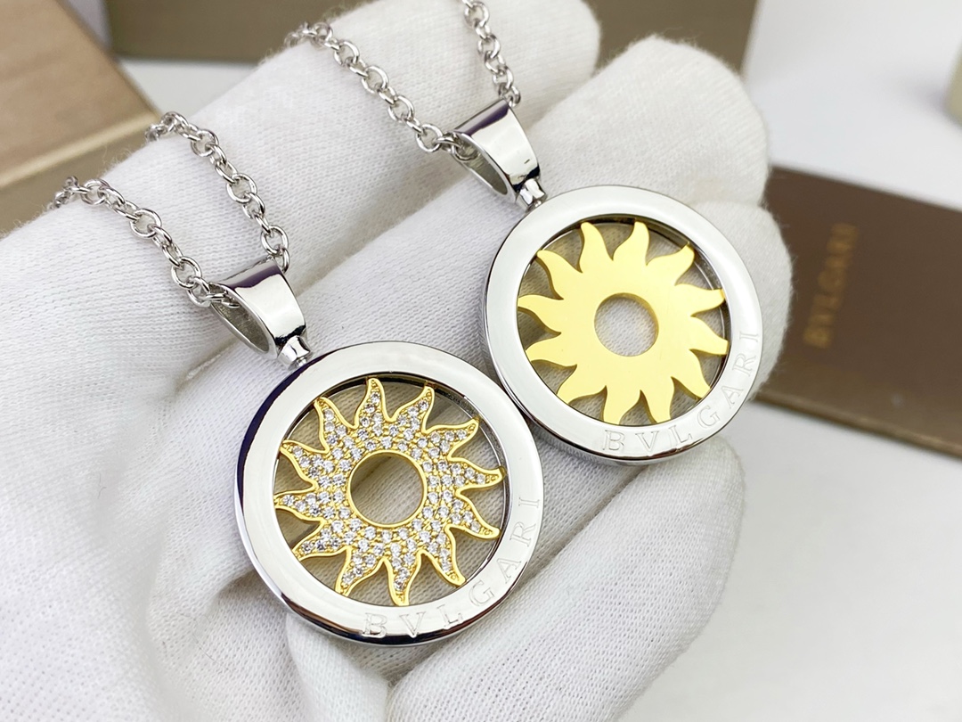 Bvlgari Bvlgari Bvlgari Sun Pendant necklace 18k white gold chain and bezel 18k yellow gold sun motif clear pave diamonds 65cm