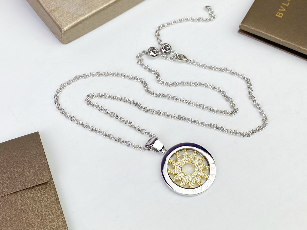 Bvlgari Bvlgari Bvlgari Sun Pendant necklace 18k white gold chain and bezel 18k yellow gold sun motif clear pave diamonds 65cm