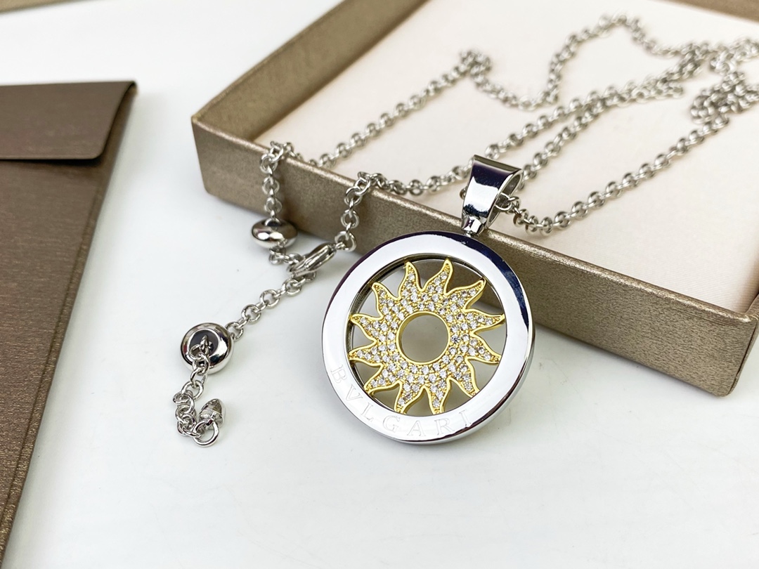 Bvlgari Bvlgari Bvlgari Sun Pendant necklace 18k white gold chain and bezel 18k yellow gold sun motif clear pave diamonds 65cm