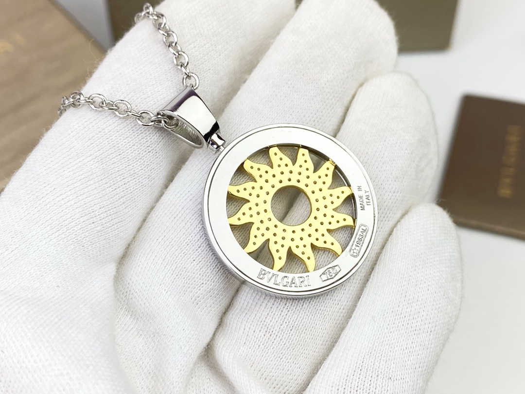 Bvlgari Bvlgari Bvlgari Sun Pendant necklace 18k white gold chain and bezel 18k yellow gold sun motif clear pave diamonds 65cm