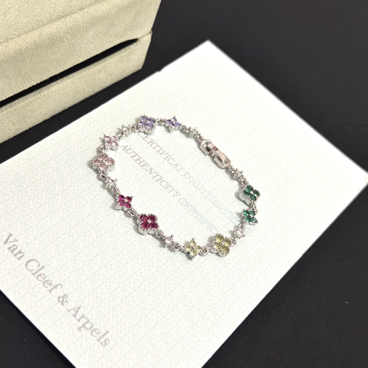 Van Cleef Arpels Alhambra bracelet Silver-toned metal with multicolor gemstones green yellow red pink purple and clear diamond accents 17cm