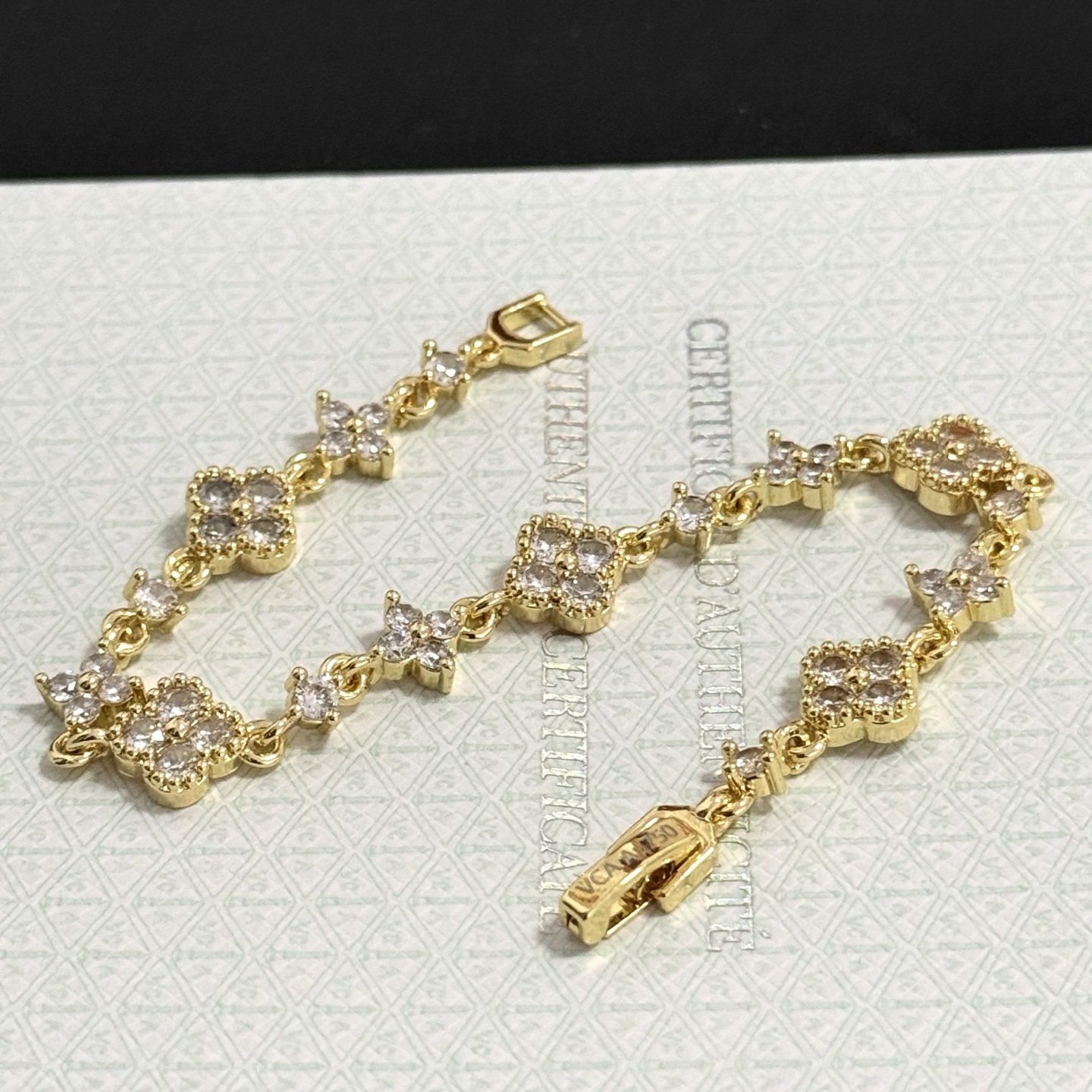 Van Cleef Arpels Alhambra bracelet gold-tone metal with clear diamond-like stones 17cm