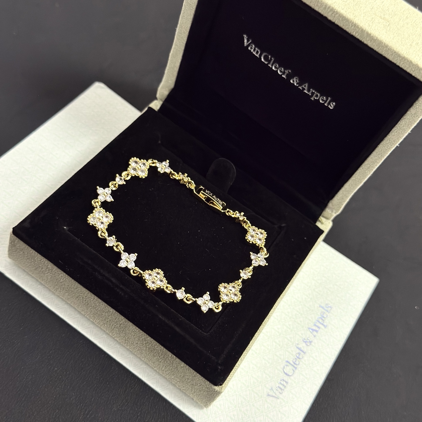 Van Cleef Arpels Alhambra bracelet gold-tone metal with clear diamond-like stones 17cm