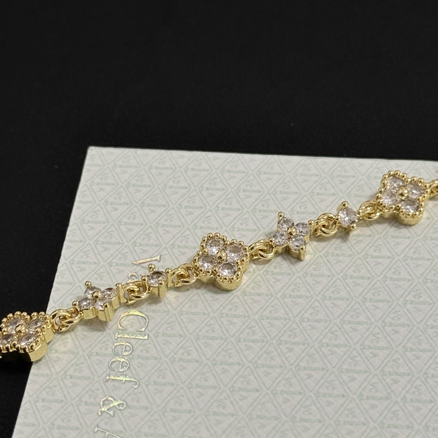Van Cleef Arpels Alhambra bracelet gold-tone metal with clear diamond-like stones 17cm
