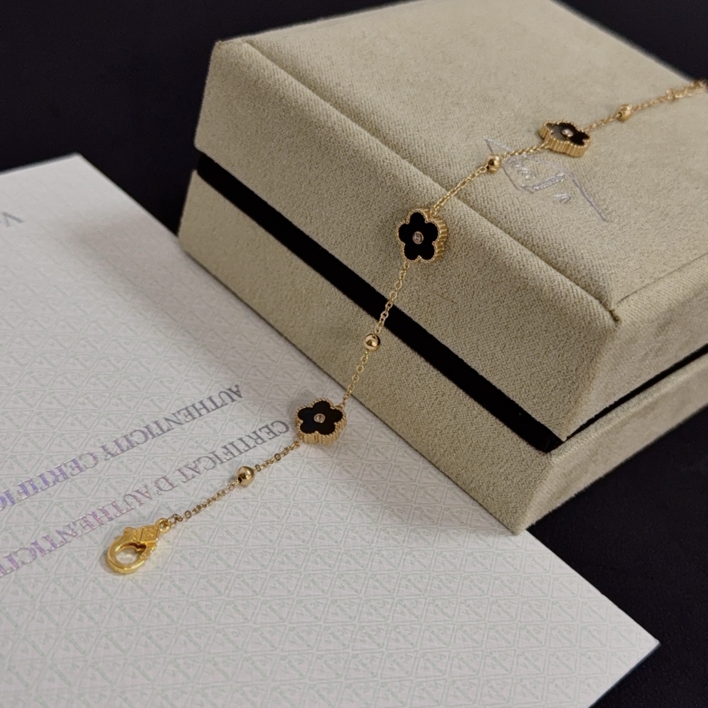 Van Cleef Arpels Alhambra bracelet yellow gold metal black onyx clover motifs clear diamond accents 17cm with 2cm extension chain