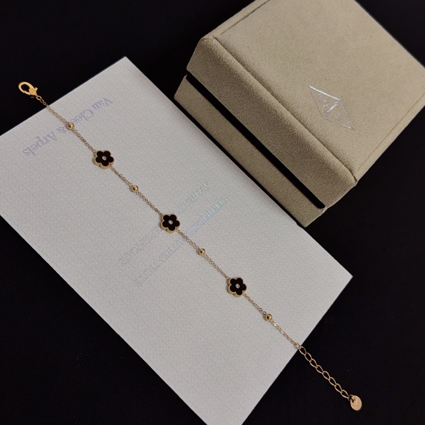 Van Cleef Arpels Alhambra bracelet yellow gold metal black onyx clover motifs clear diamond accents 17cm with 2cm extension chain