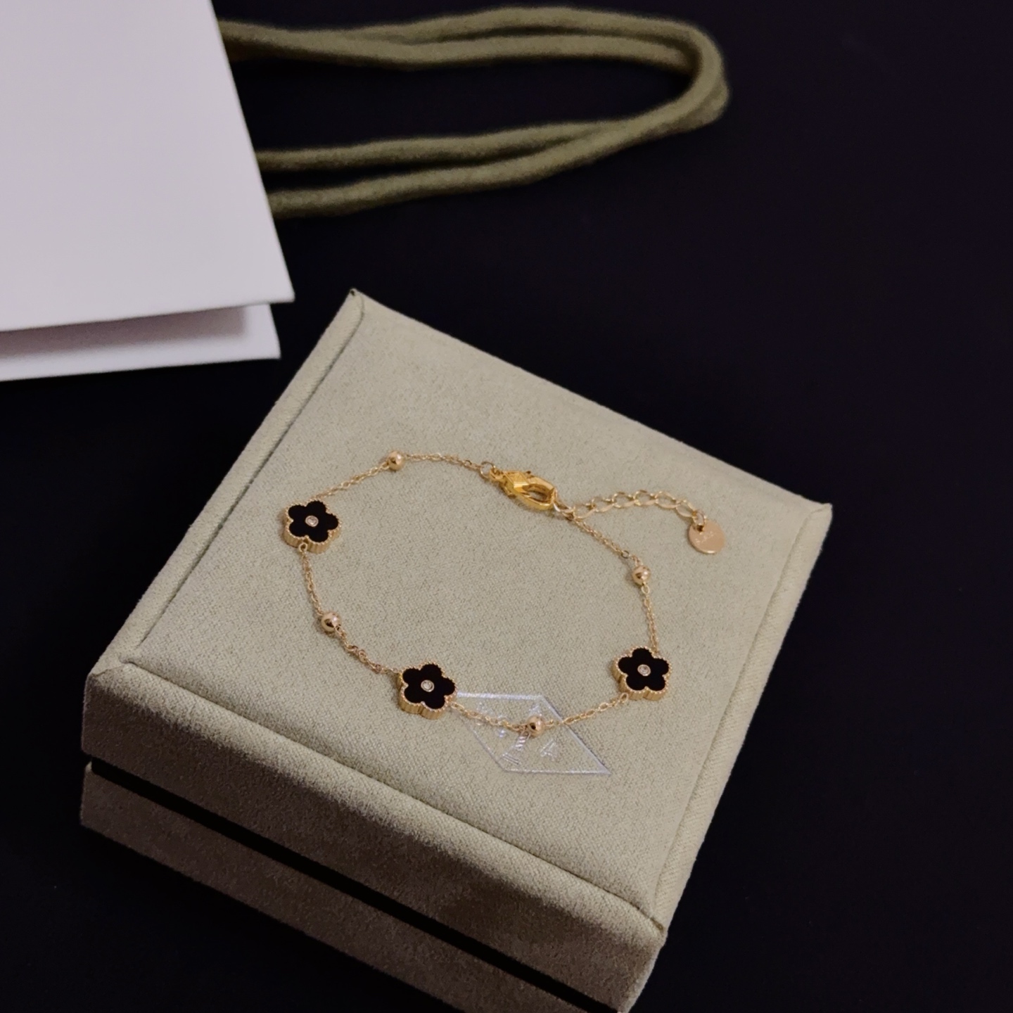 Van Cleef Arpels Alhambra bracelet yellow gold metal black onyx clover motifs clear diamond accents 17cm with 2cm extension chain