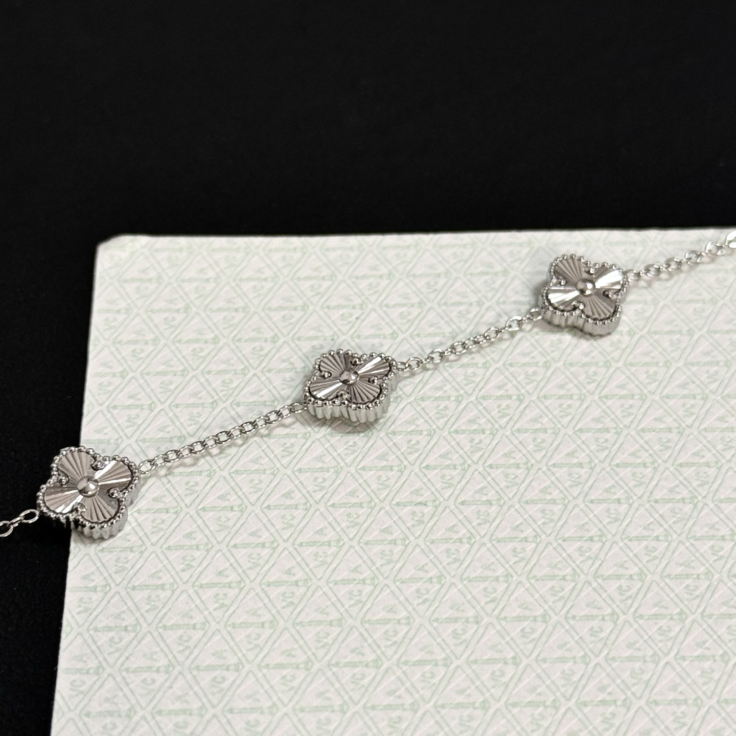 Van Cleef Arpels Alhambra bracelet silver metal with guilloche engraved clover motifs 19cm