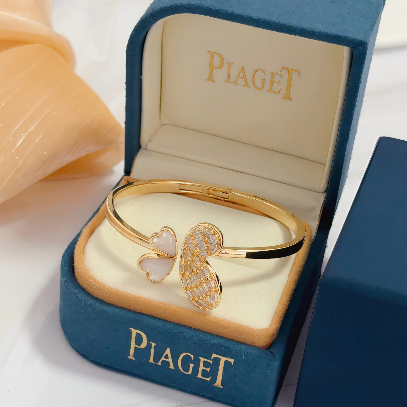 Piaget Butterfly bracelet gold-tone metal with white mother-of-pearl and clear baguette-cut stones 17cm