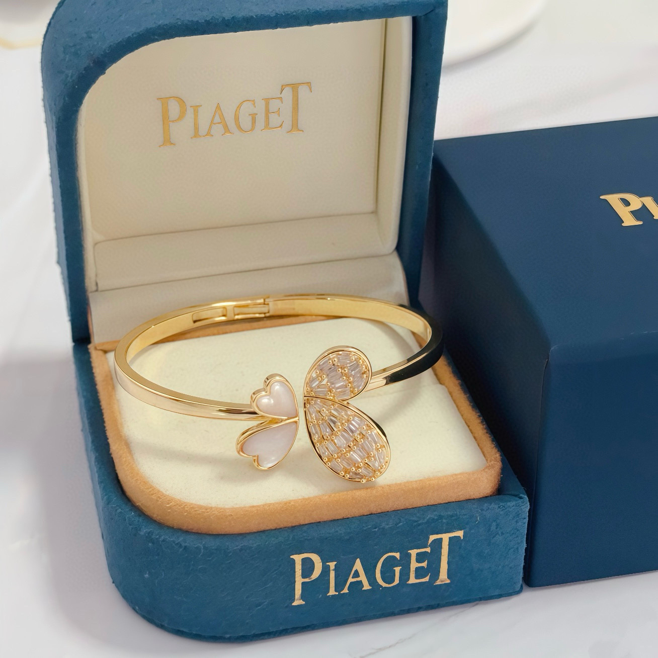 Piaget Butterfly bracelet gold-tone metal with white mother-of-pearl and clear baguette-cut stones 17cm