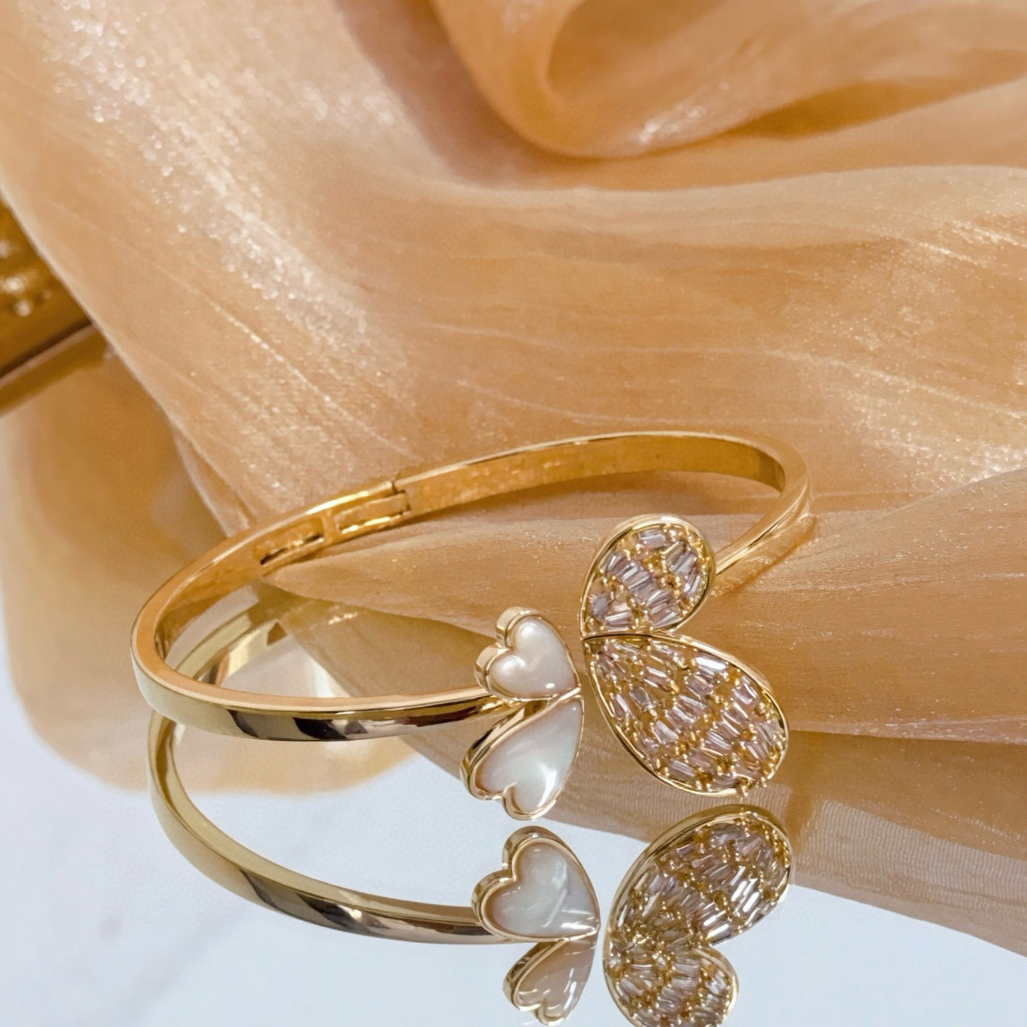 Piaget Butterfly bracelet gold-tone metal with white mother-of-pearl and clear baguette-cut stones 17cm