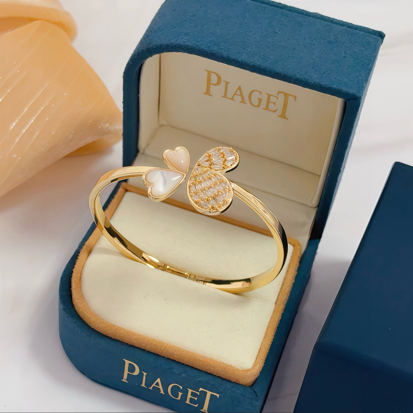Piaget Butterfly bracelet gold-tone metal with white mother-of-pearl and clear baguette-cut stones 17cm