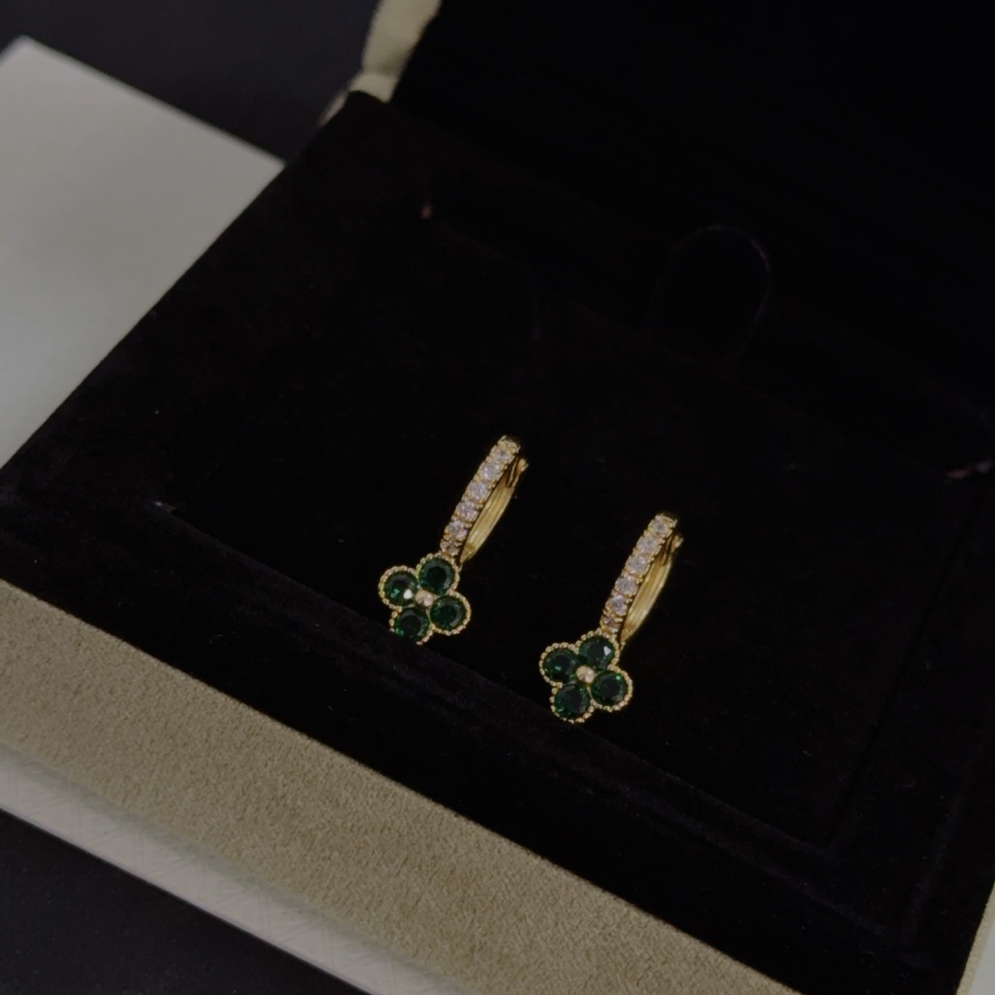 Van Cleef Arpels Alhambra earrings yellow gold metal with green gemstone clover motifs and clear diamond accents 10mm hoop diameter