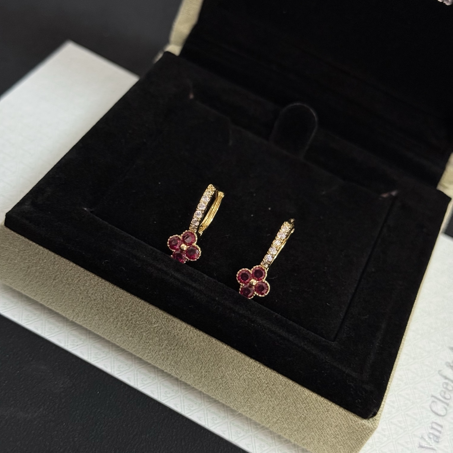 Van Cleef Arpels Alhambra earrings yellow gold metal ruby red clover stones clear diamond accent stones 10mm hoop diameter
