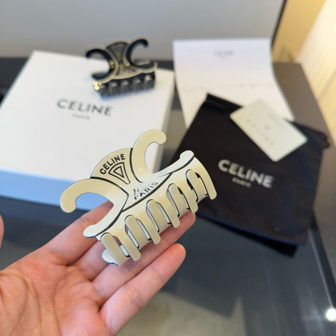 Celine Triomphe Paris Logo Hair Claw brooch Ivory enamel with silver-tone metal accents Black enamel with silver-tone metal accents 8cm