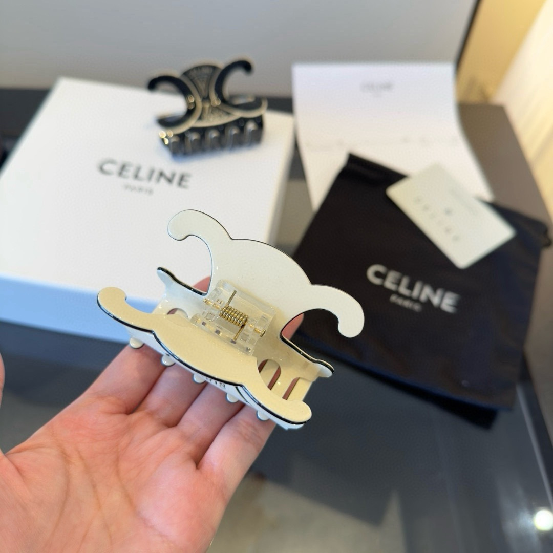 Celine Triomphe Paris Logo Hair Claw brooch Ivory enamel with silver-tone metal accents Black enamel with silver-tone metal accents 8cm