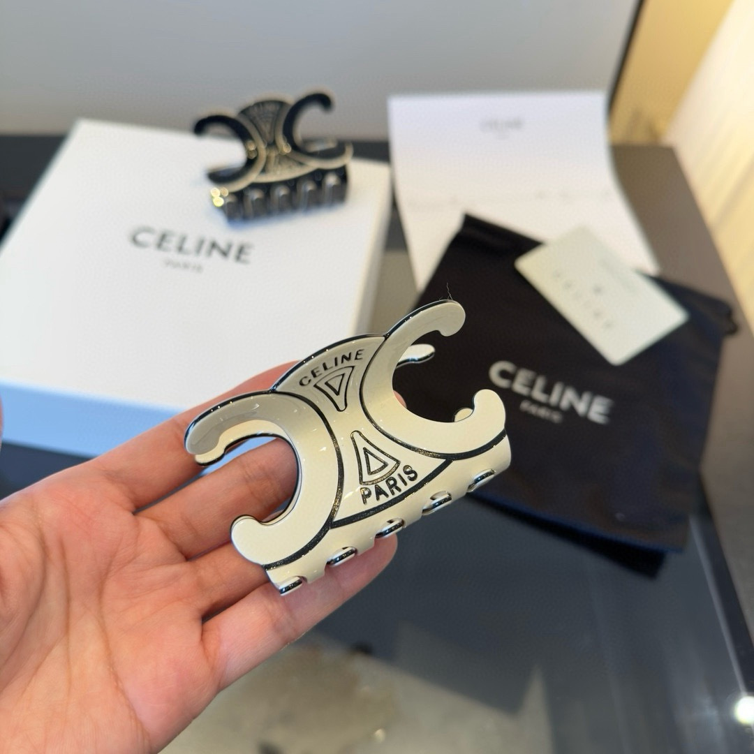 Celine Triomphe Paris Logo Hair Claw brooch Ivory enamel with silver-tone metal accents Black enamel with silver-tone metal accents 8cm