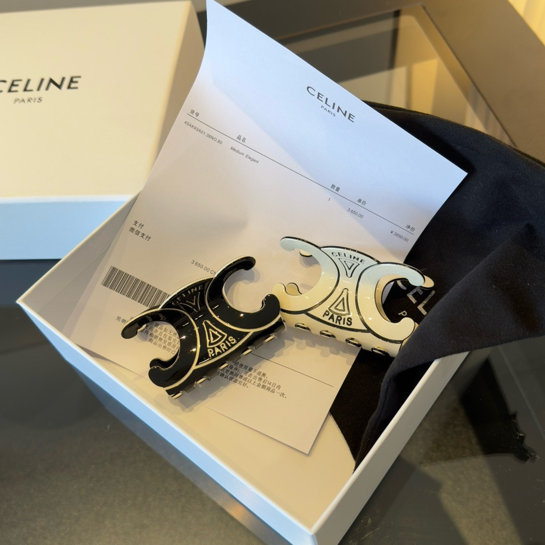 Celine Triomphe Paris Hair Claw brooch Black enamel with gold-tone metal accents Ivory enamel with gold-tone metal accents 6cm