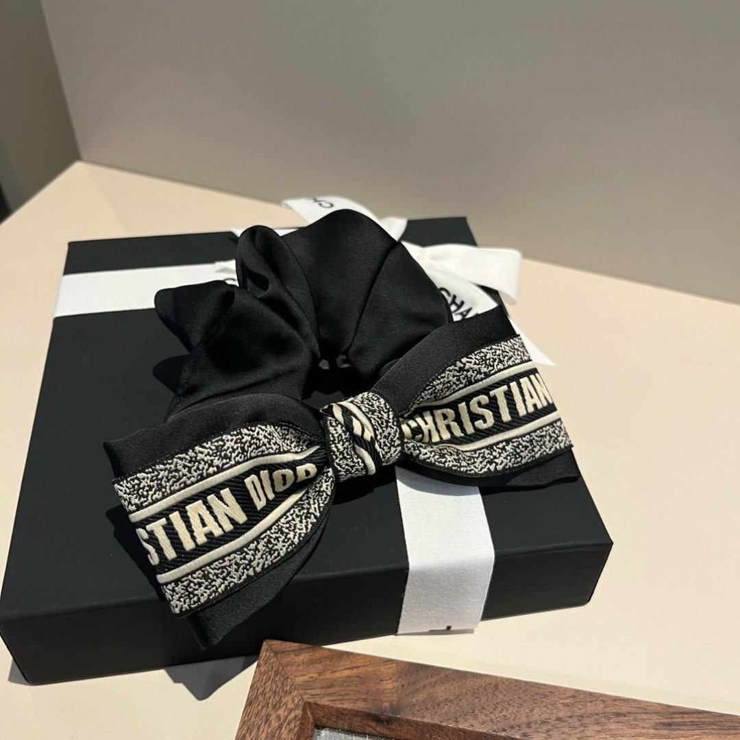 Dior Christian Dior Logo Bow Scrunchie brooch black satin fabric with off-white embroidered logo detailing 12cm bow width 10cm scrunchie diameter