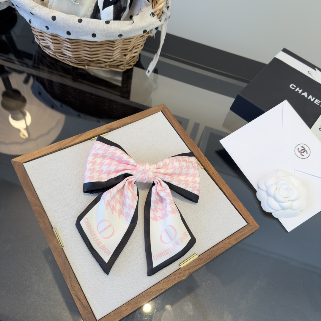 Dior Houndstooth CD Logo Bow Hair Accessory brooch Pink white black fabric with pink printed branding 15cm width
