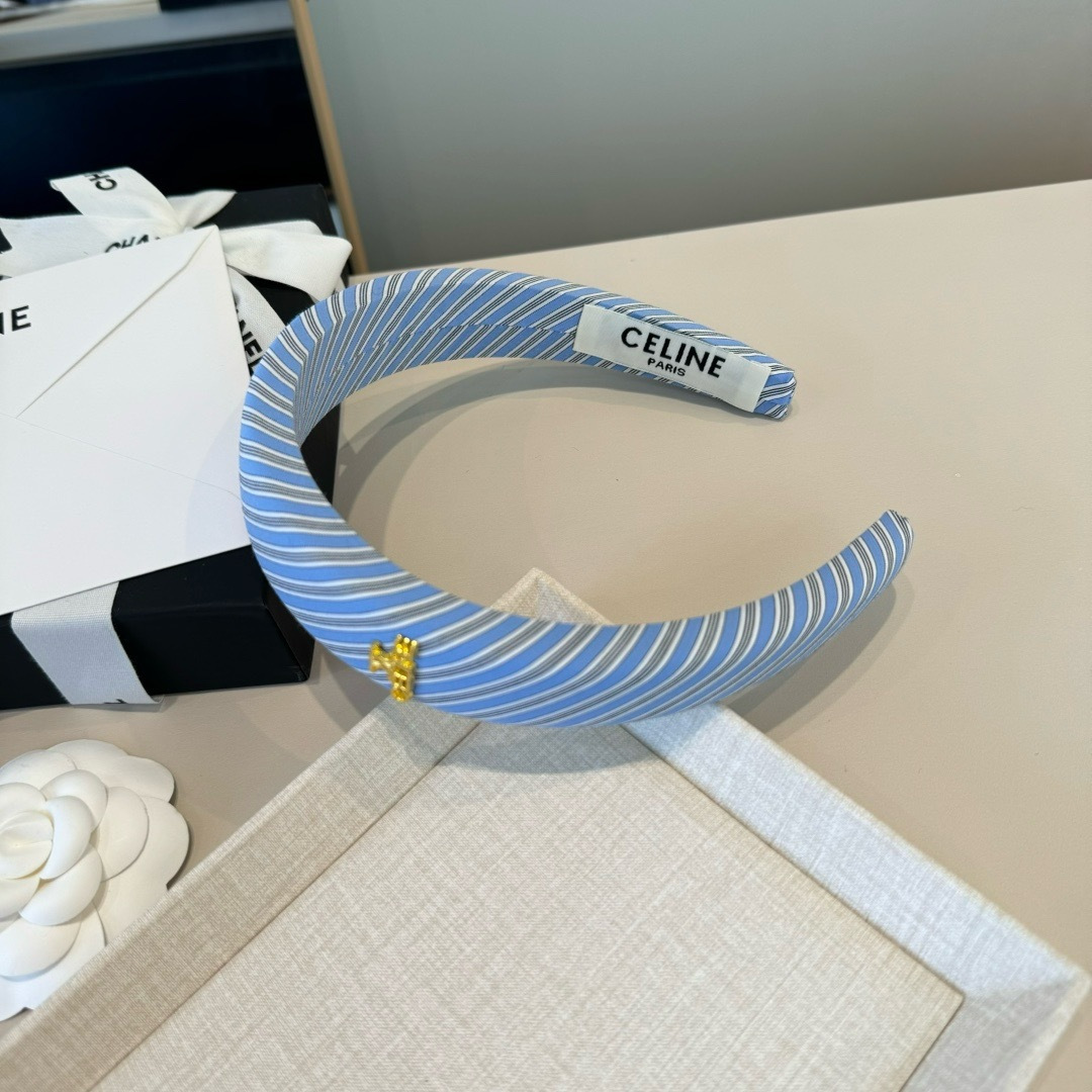Celine Triomphe Padded Striped Headband brooch Light blue white gray striped fabric with gold-tone Triomphe logo hardware One Size standard headband width 3cm circumference 40cm