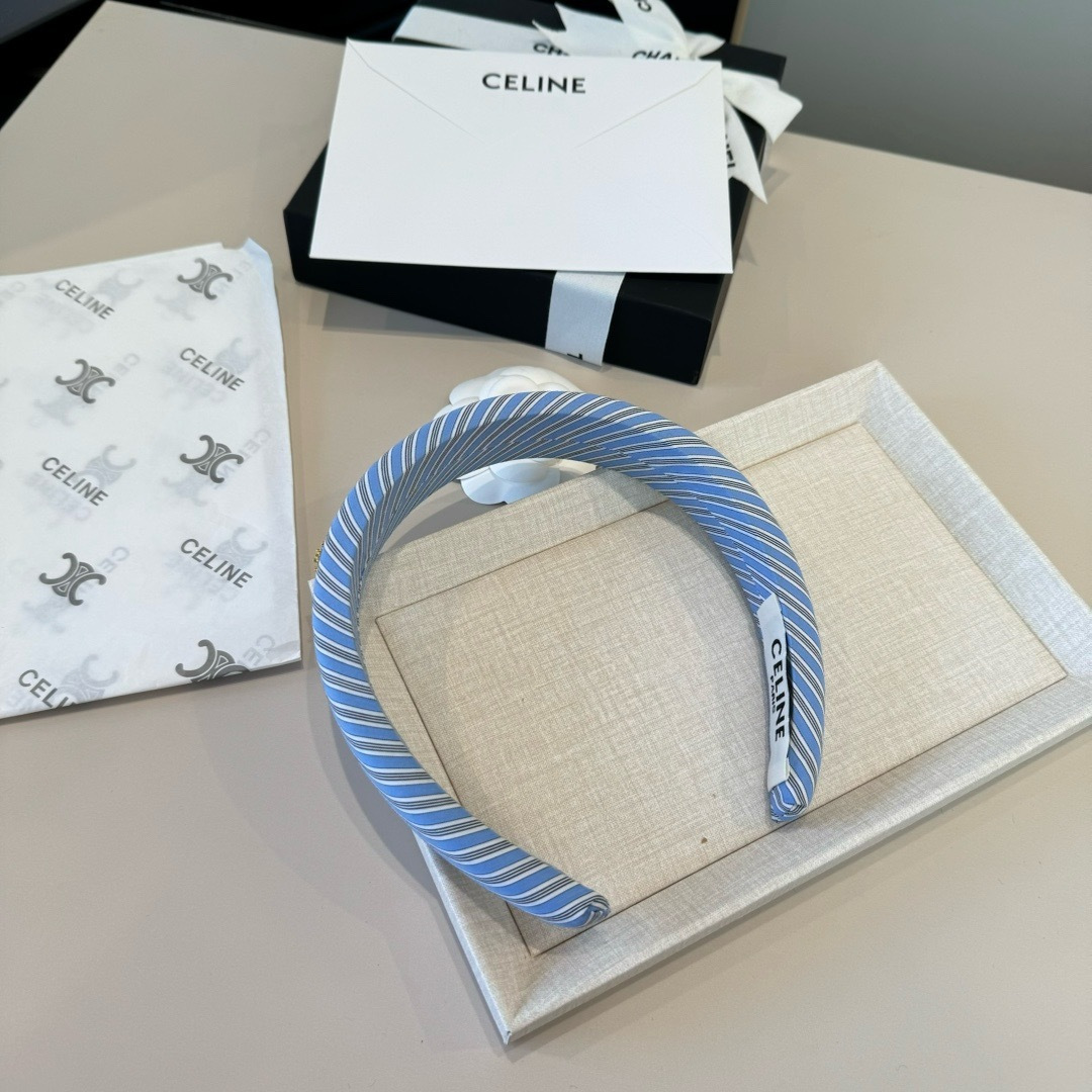 Celine Triomphe Padded Striped Headband brooch Light blue white gray striped fabric with gold-tone Triomphe logo hardware One Size standard headband width 3cm circumference 40cm