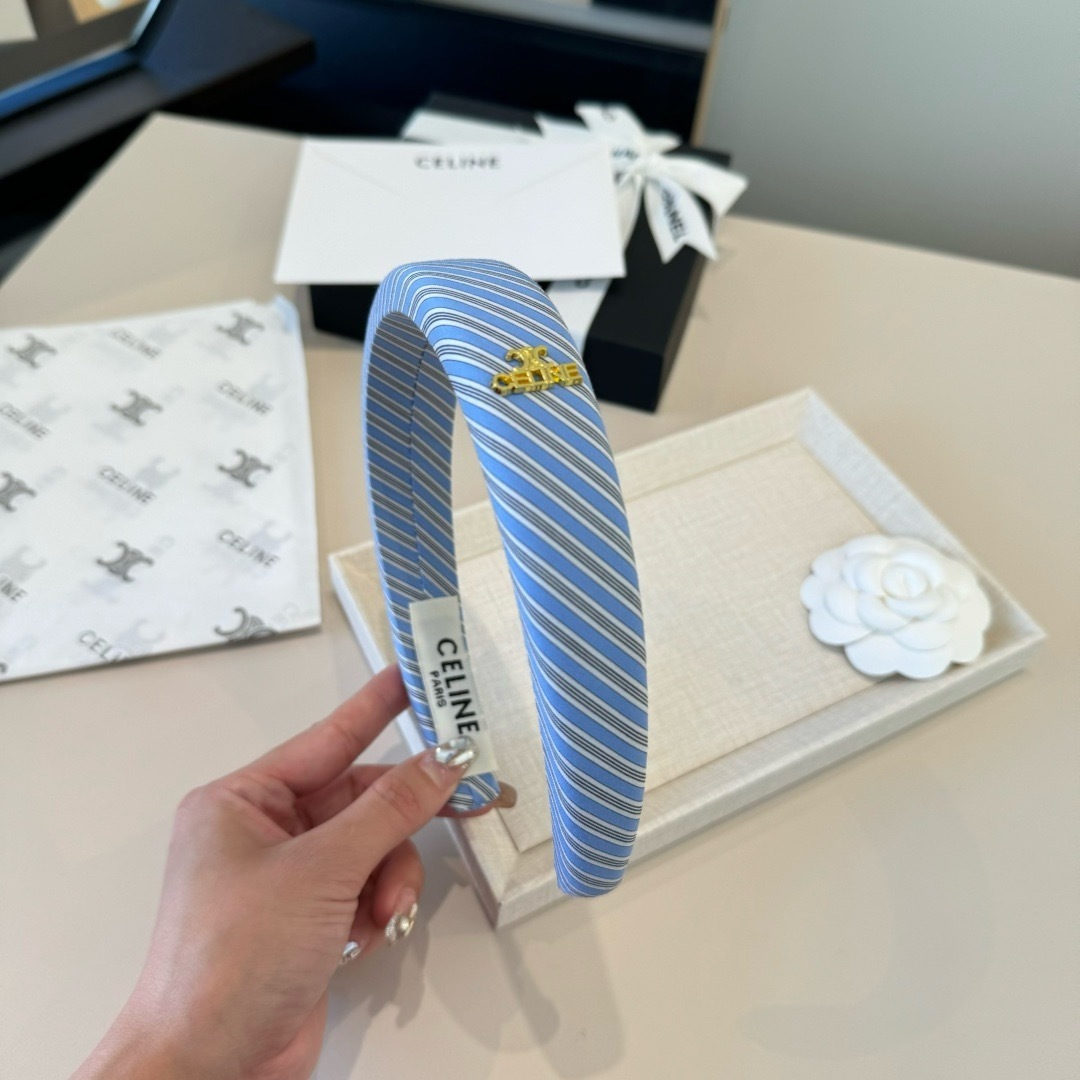 Celine Triomphe Padded Striped Headband brooch Light blue white gray striped fabric with gold-tone Triomphe logo hardware One Size standard headband width 3cm circumference 40cm