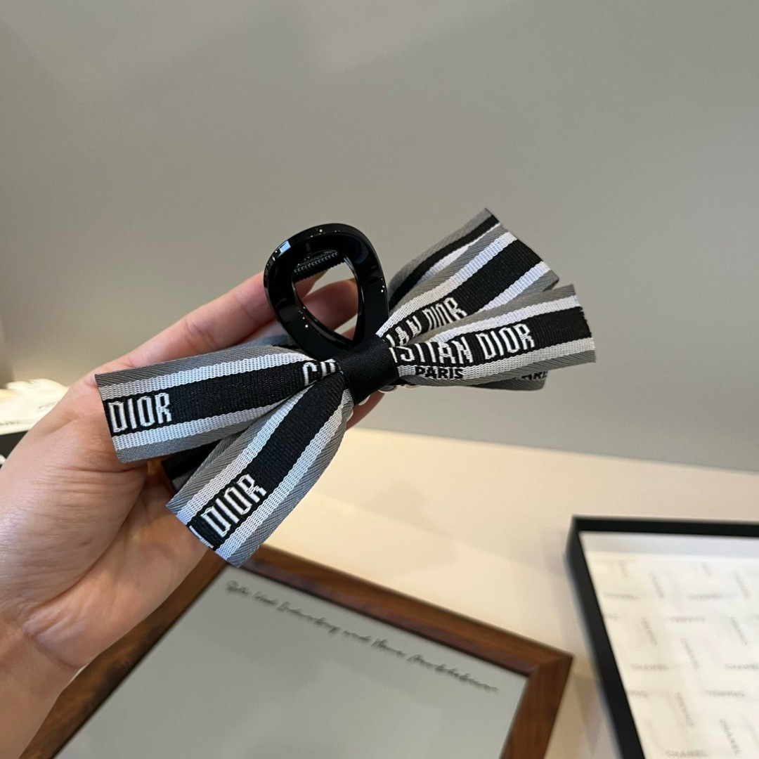 Dior Christian Dior Paris Ribbon Bow Hair Claw brooch Black glossy plastic base black gray white woven fabric ribbon with white logo text 10cm