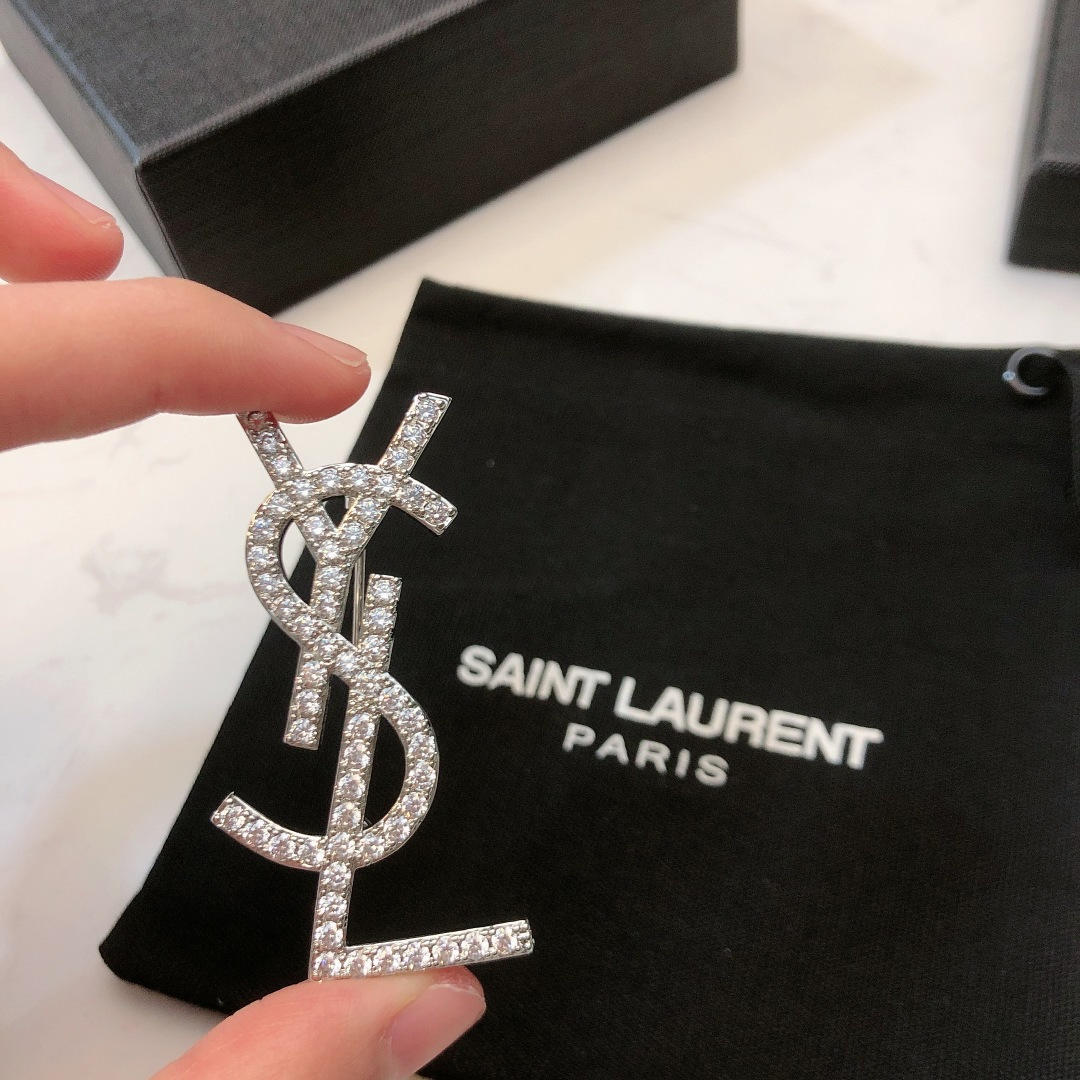 Saint Laurent YSL Monogram Crystal Brooch brooch silver-toned metal with clear crystal accents 3 5cm