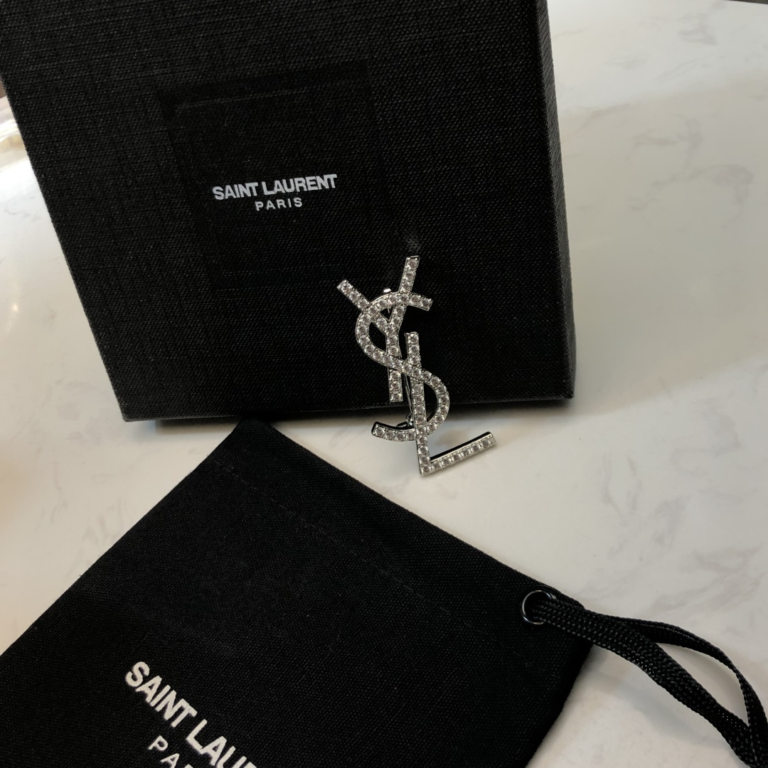Saint Laurent YSL Monogram Crystal Brooch brooch silver-toned metal with clear crystal accents 3 5cm