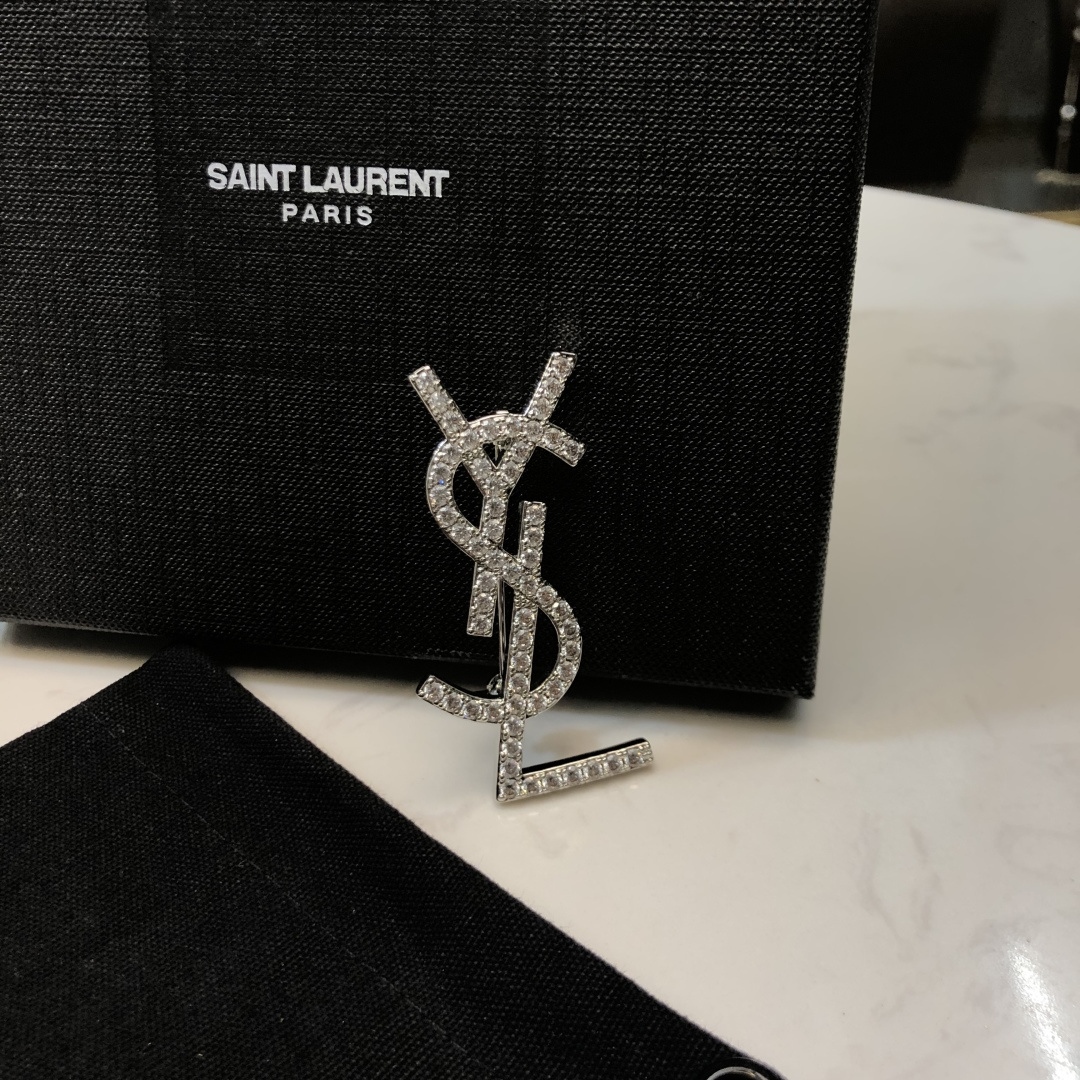 Saint Laurent YSL Monogram Crystal Brooch brooch silver-toned metal with clear crystal accents 3 5cm