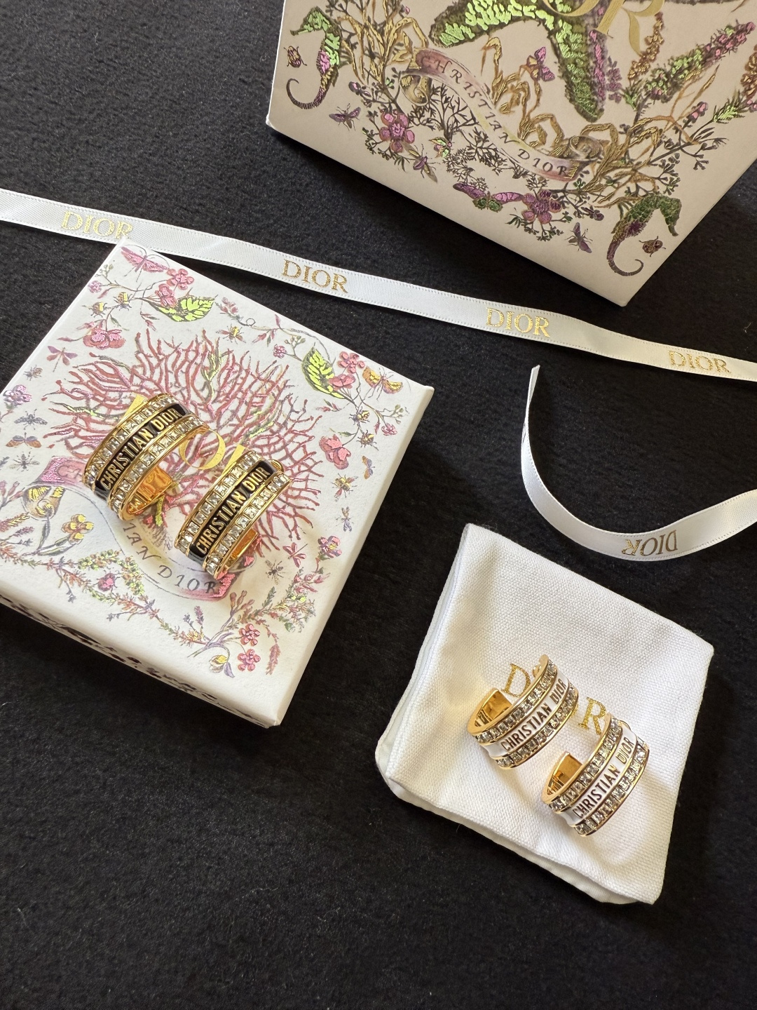 Dior Dior Code earrings gold-tone metal with clear crystal accents available with black or white enamel bands 1 5cm hoop diameter