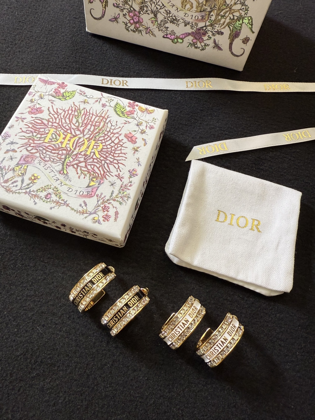 Dior Dior Code earrings gold-tone metal with clear crystal accents available with black or white enamel bands 1 5cm hoop diameter