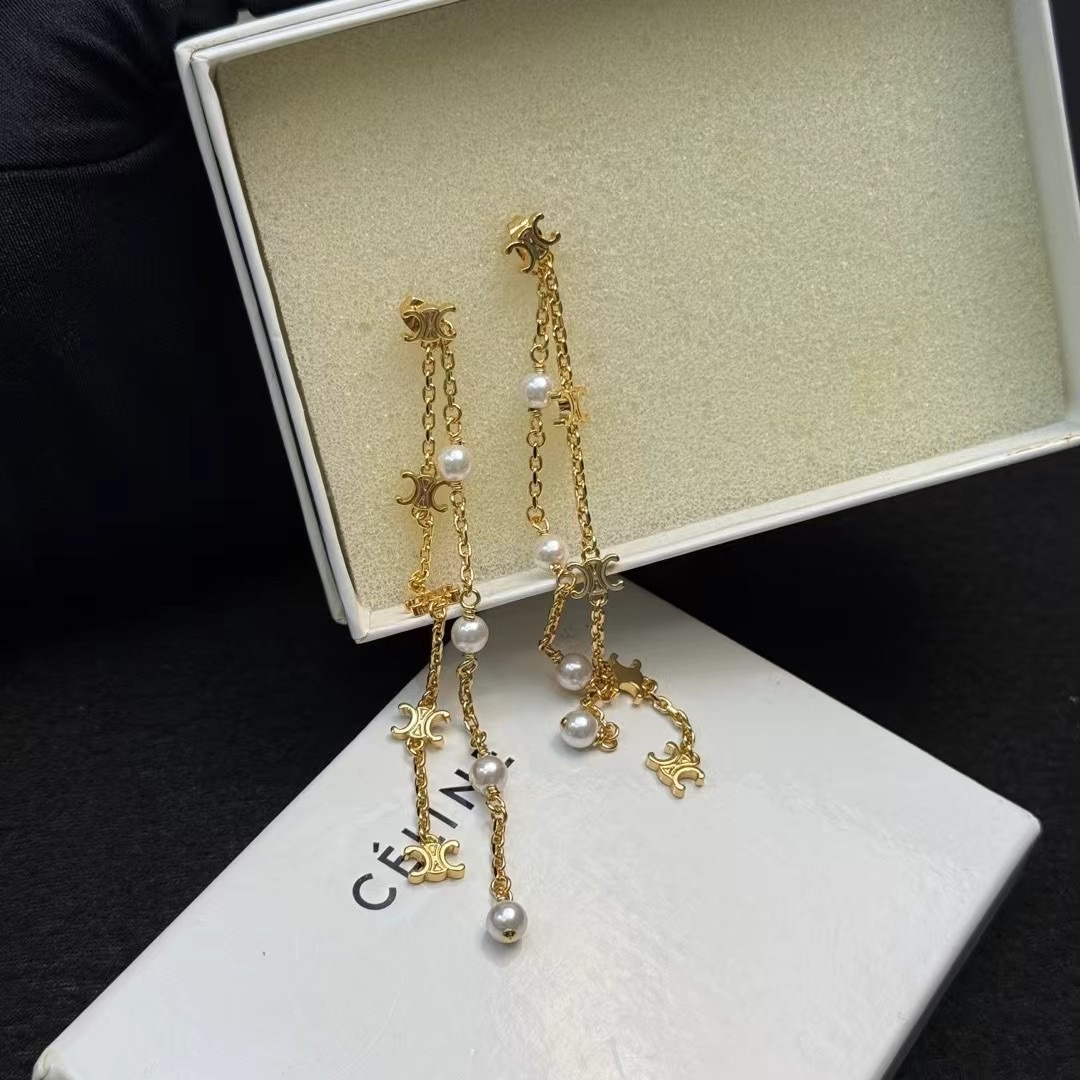 Celine Triomphe Pearl Long Chain Drop Earrings earrings Gold-tone metal with white pearl accents Approximately 7cm drop length