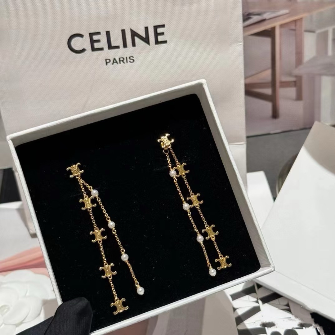 Celine Triomphe Pearl Long Chain Drop Earrings earrings Gold-tone metal with white pearl accents Approximately 7cm drop length