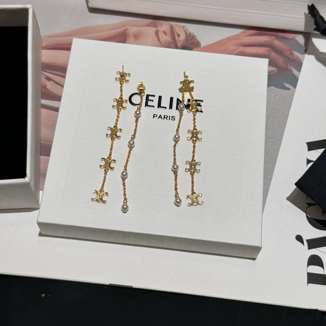 Celine Triomphe Pearl Long Chain Drop Earrings earrings Gold-tone metal with white pearl accents Approximately 7cm drop length