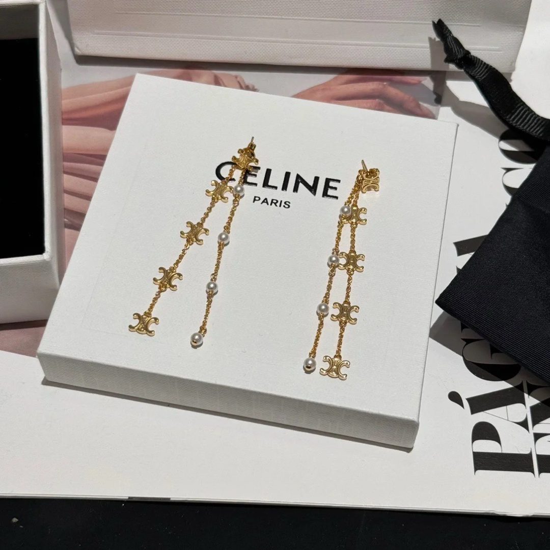 Celine Triomphe Pearl Long Chain Drop Earrings earrings Gold-tone metal with white pearl accents Approximately 7cm drop length