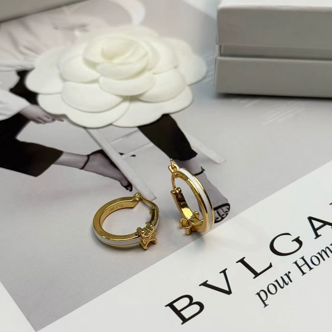 Celine Triomphe earrings gold-tone metal with white enamel accents 1 5cm hoop diameter