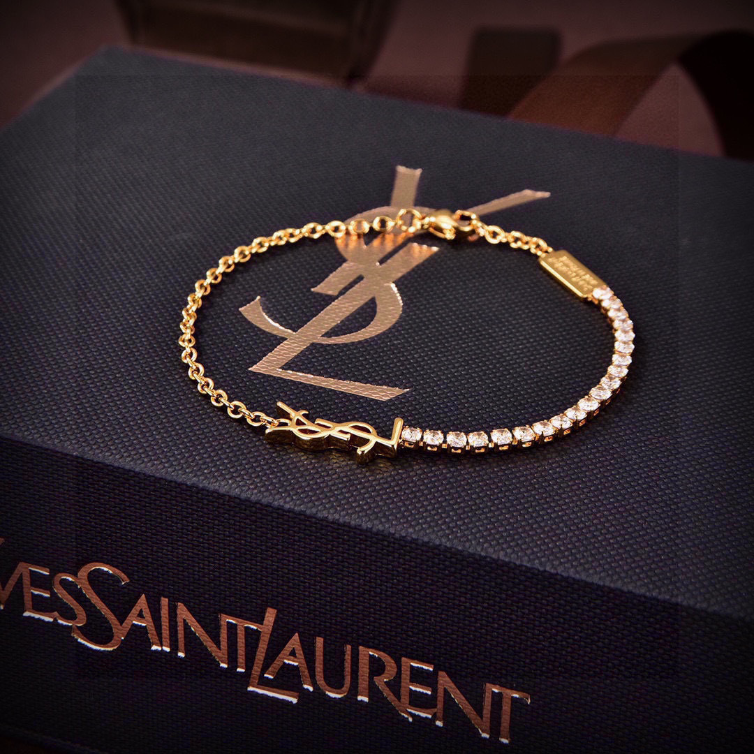 Saint Laurent Cassandre YSL Crystal Tennis Bracelet bracelet gold-tone metal with clear faceted crystals 18cm with 3cm extension chain