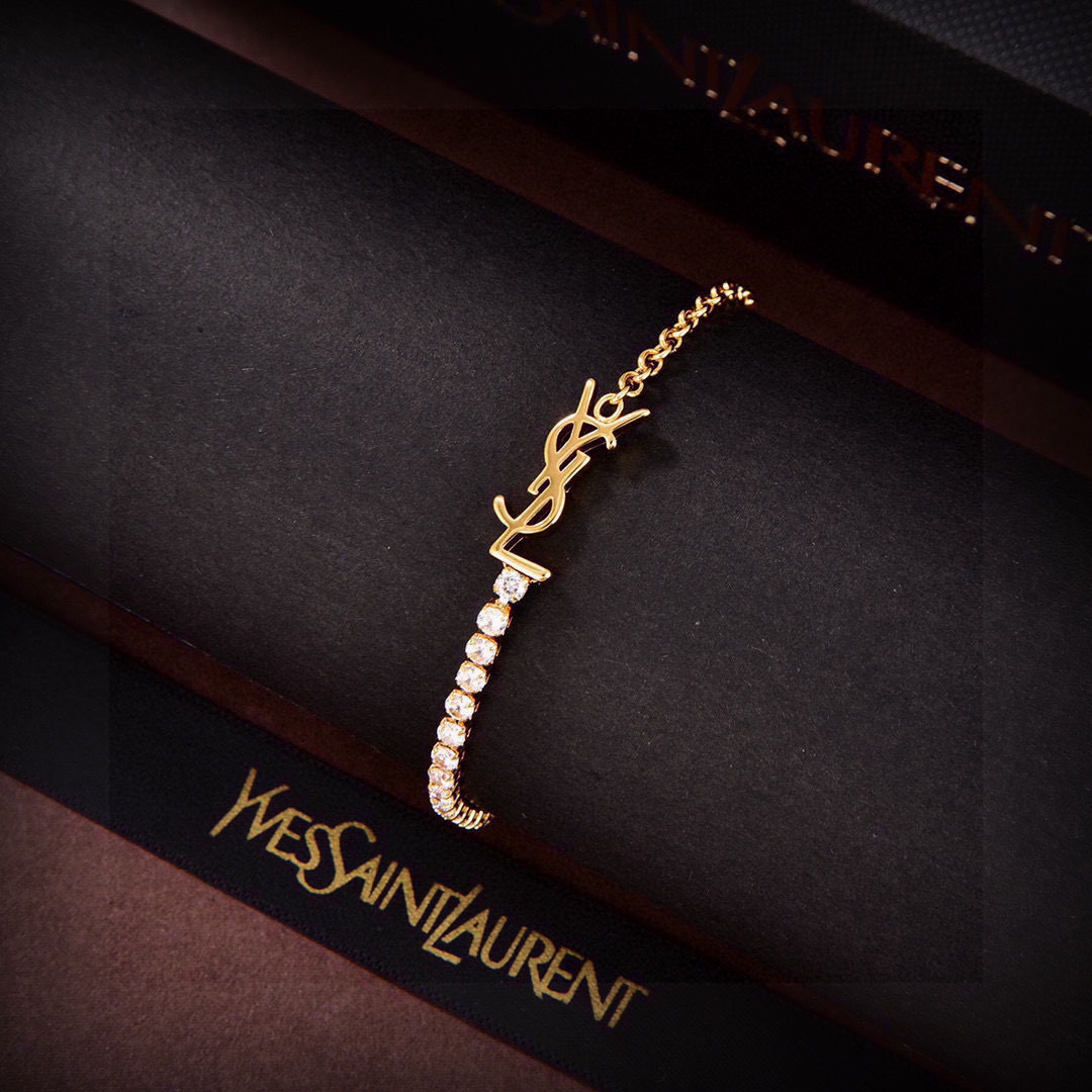 Saint Laurent Cassandre YSL Crystal Tennis Bracelet bracelet gold-tone metal with clear faceted crystals 18cm with 3cm extension chain
