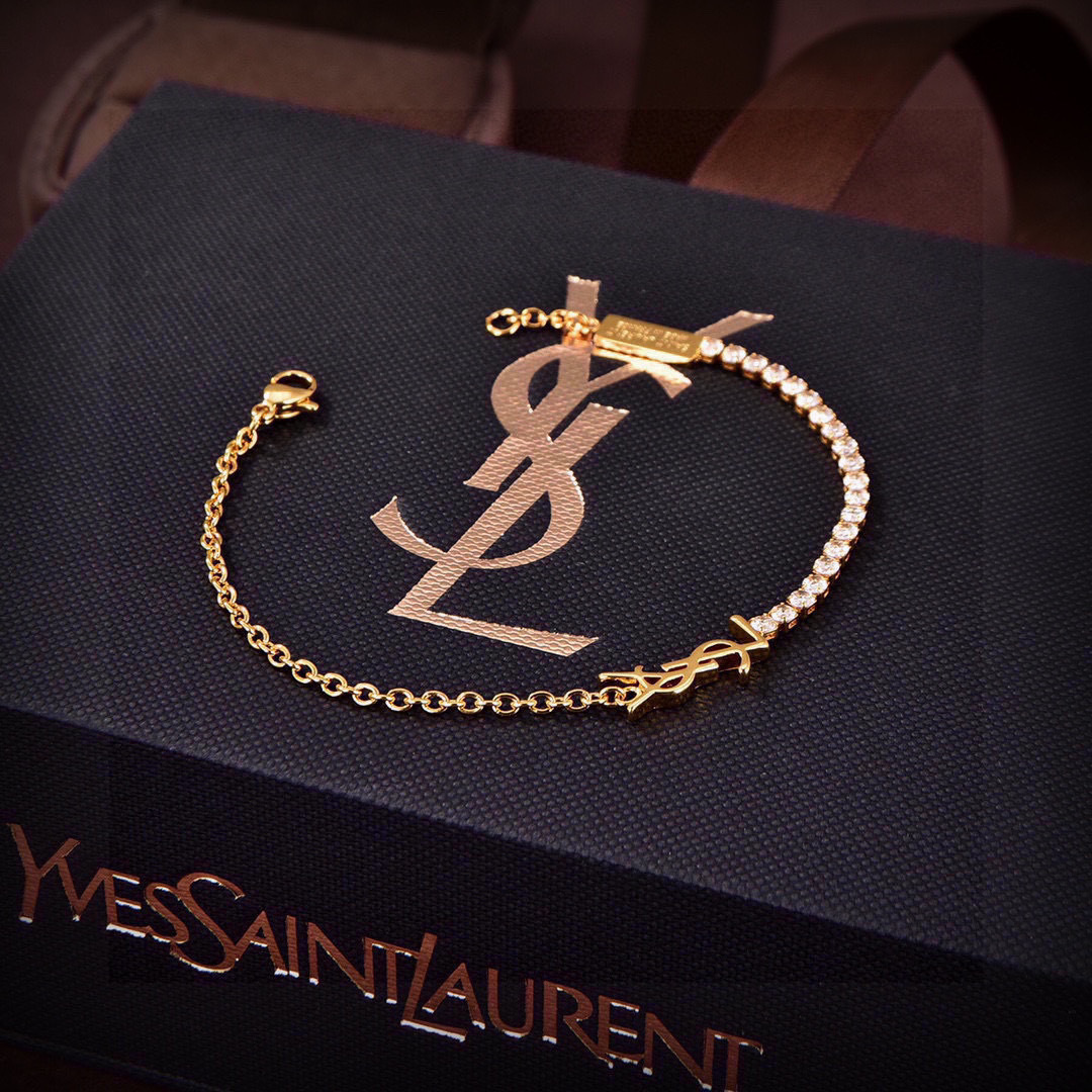Saint Laurent Cassandre YSL Crystal Tennis Bracelet bracelet gold-tone metal with clear faceted crystals 18cm with 3cm extension chain