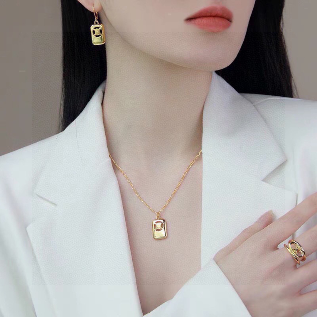 Celine Triomphe Cutout Tag earrings gold-tone metal no gemstones 2 5cm drop length