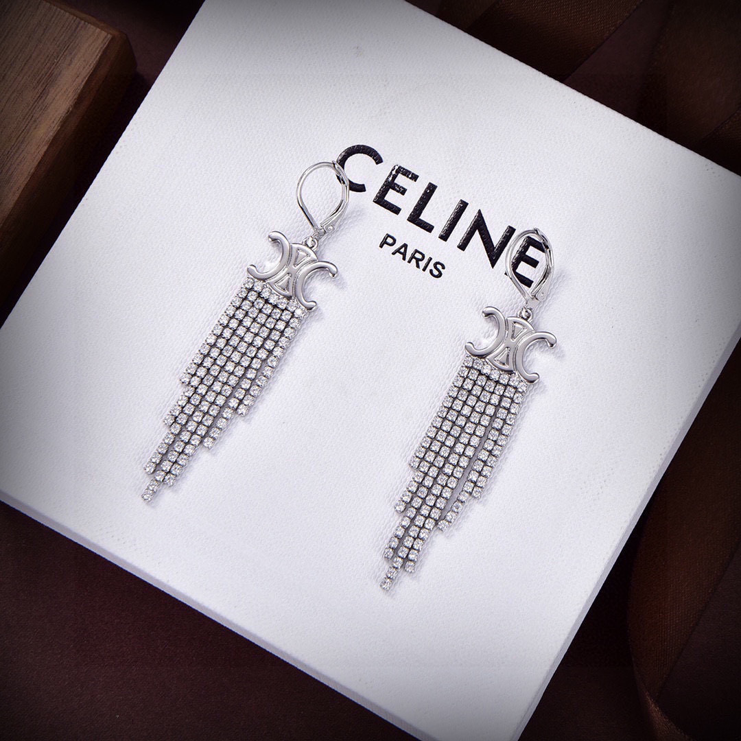 Celine Triomphe Fringe earrings 18k gold-tone metal with clear crystal rhinestones also available in silver-tone metal with clear crystal rhinestones 7cm drop length