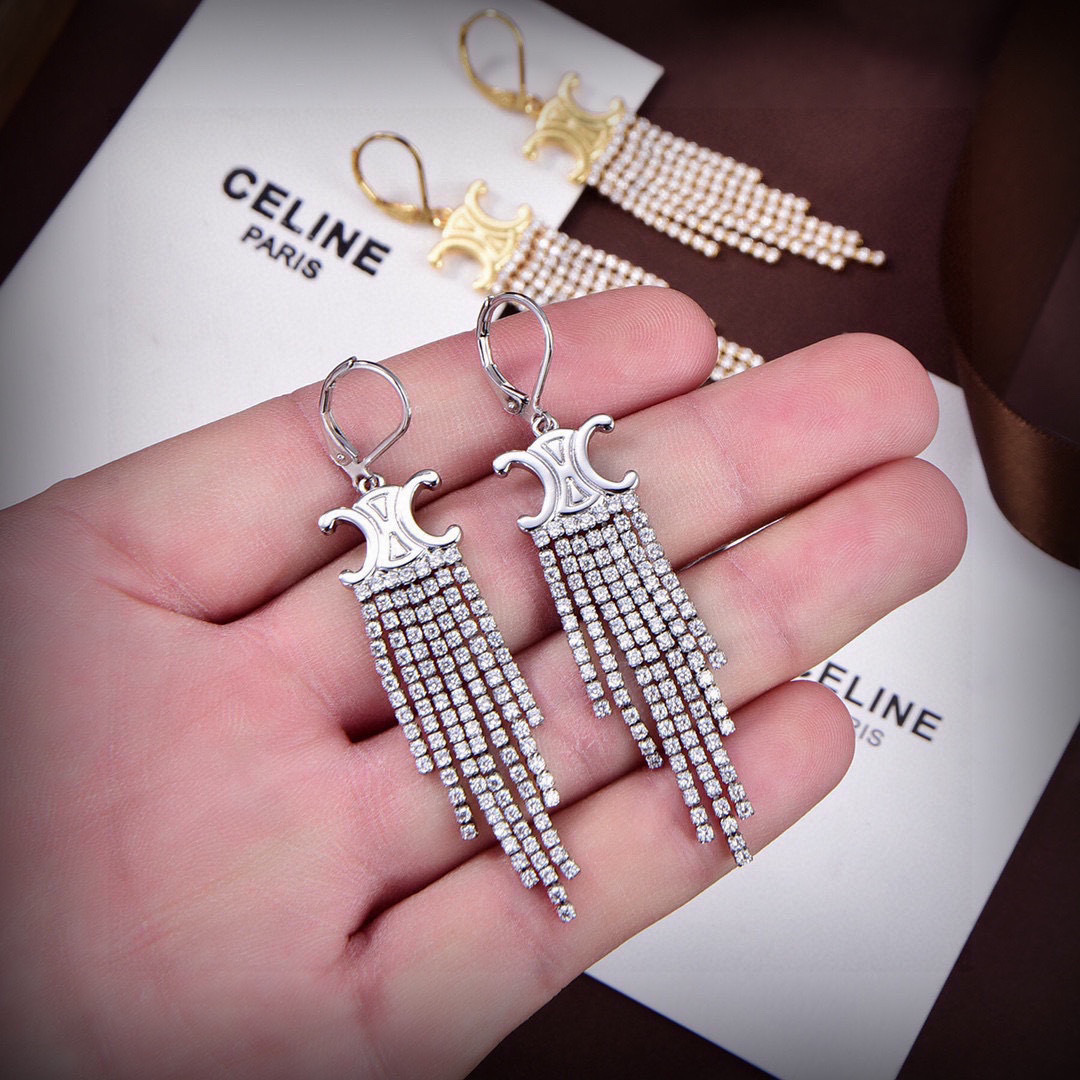 Celine Triomphe Fringe earrings 18k gold-tone metal with clear crystal rhinestones also available in silver-tone metal with clear crystal rhinestones 7cm drop length