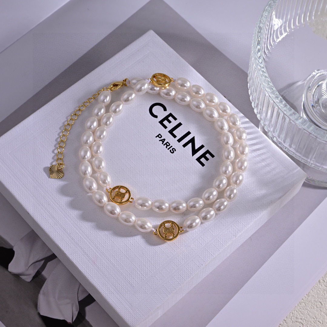 Celine Triomphe Pearl necklace gold-tone metal white pearl 42cm with 5cm extender