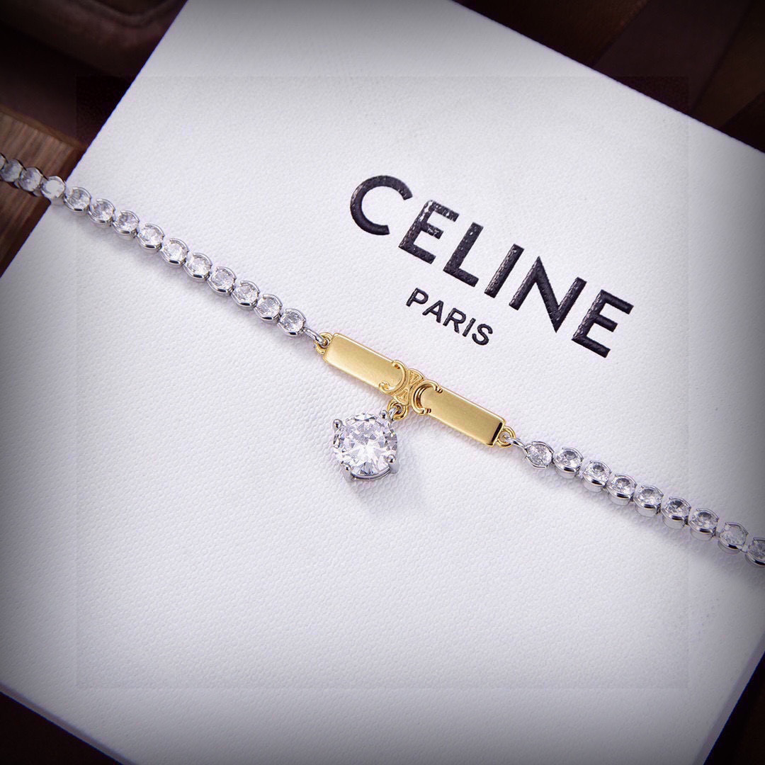 Celine Triomphe Crystal Bar Pendant necklace silver-toned metal with gold-tone Triomphe bar clear crystal accents 40cm with 5cm extender