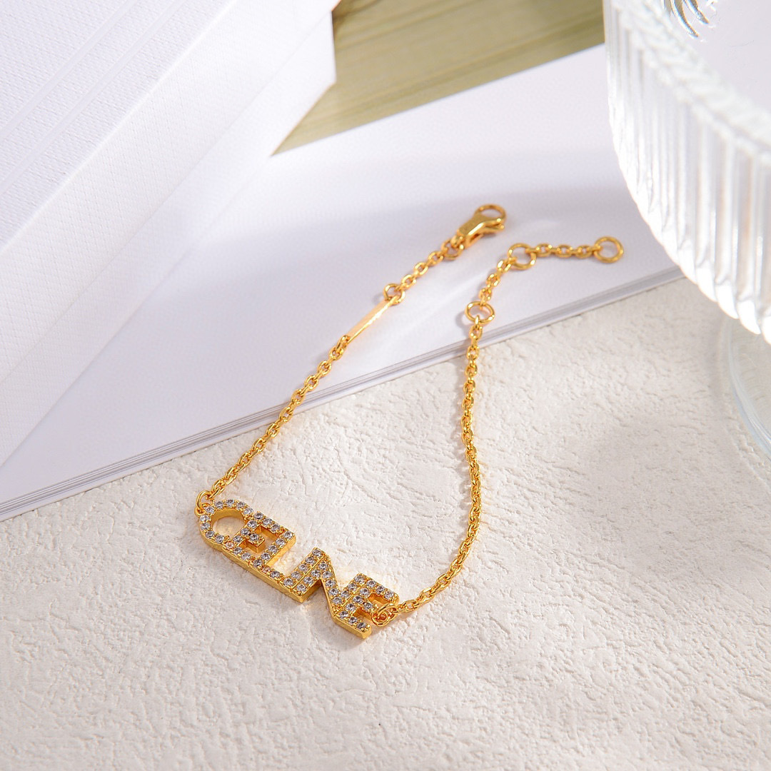 Celine Logo Crystal Bracelet bracelet Gold-tone metal with clear crystal accents Silver-tone metal with clear crystal accents 16cm with 3cm extender