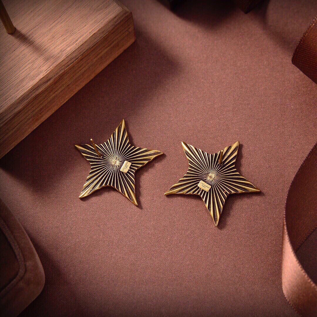 Saint Laurent 1961 Star Stud Earrings earrings Antique gold-tone metal with dark oxidized radial detailing no gemstones One Size approx 2 5cm width per earring