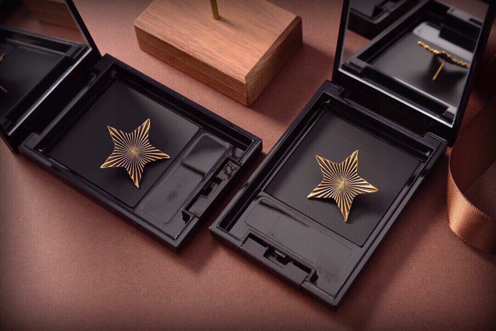 Saint Laurent 1961 Star Stud Earrings earrings Antique gold-tone metal with dark oxidized radial detailing no gemstones One Size approx 2 5cm width per earring
