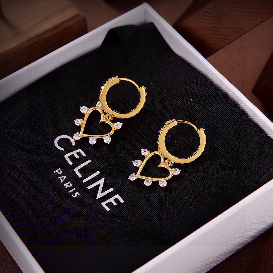 Celine Crystal Heart Hoop Earrings earrings gold-tone metal with clear crystal accents 1 5cm drop length